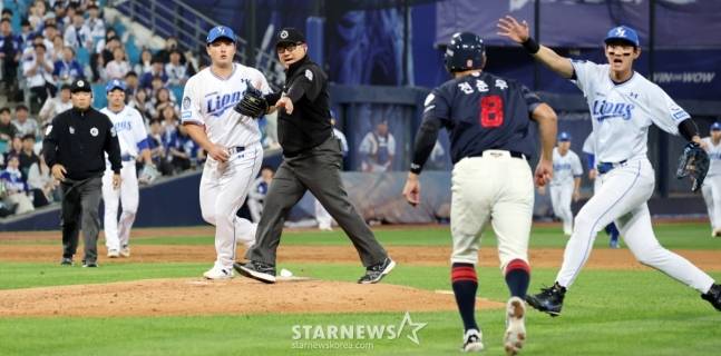 삼성과 롯데 선수단이 벤치 클리어링을 일으키고 있다. /사진=강영조 선임기자