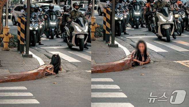 지난 26일 필리핀 미카타시의 번화가 모퉁이 하수구에서 여성 노숙자가 기어 나오는 모습. (사진은 William Roberts 인스타그램 갈무리)