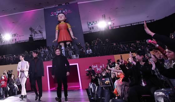 Actor Lee Jeong jae, Director Hwang Dong-hyuk and actor Lee Byung-hun enter a media event for the premiere of the second season of ″Squid Game″ (2021-) in Jung District, central Seoul, on Dec. 9, 2024. [NEWS1]