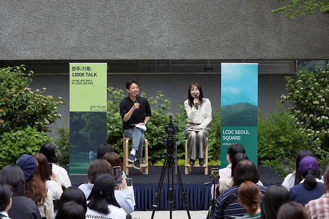 Actor Park Jeong-min, CEO of publisher Muze, left, and author Kim Keum-hee speak during a book talk for Kim's latest novel, ″My First Summer, Wanju,″ on May 23. [LCDC SEOUL]