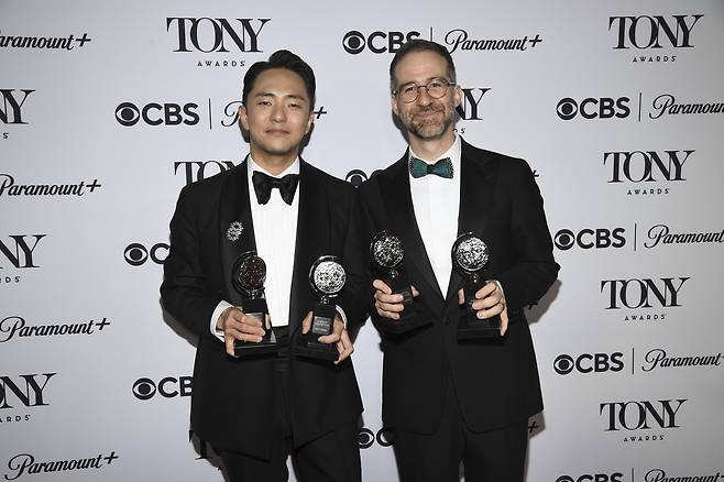 Hue Park, left, and Will Aronson pose with the Best Score award and Best Book of a Musical award for "Maybe Happy Ending" backstage at the 78th Annual Tony Awards at Radio City Music Hall on June 8, 2025, in New York City. [AP/YONHAP]