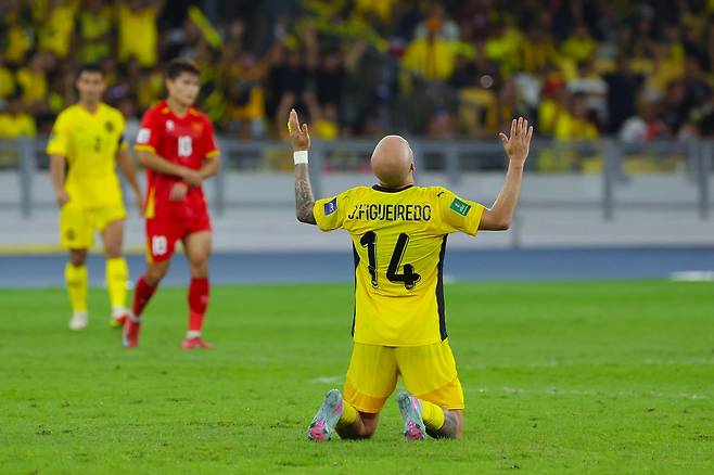 말레이시아 주앙 빅터 피게이레두가 10일 베트남전에서 골을 넣은 뒤 세리머니하고 있다. EPA연합뉴스