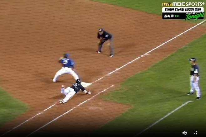 LG 문보경이 18일 잠실 NC전 7회 말 내야 땅볼을 치고 1루에서 헤드퍼스트 슬라이딩을 하고 있다. 문보경이 손이 닿기 전에 이미 공은 1루수 글러브에 도착해 있다. 사진=MBC 스포츠 플러스, 티빙 중계화면 캡처