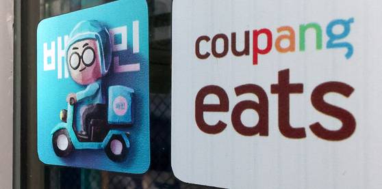 The Coupang Eats logo is adhered to a restaurant window in Seoul on Nov. 10, 2024. [NEWS1]