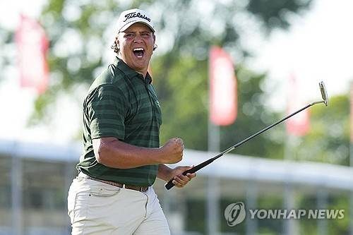 우승 퍼트를 넣고 환호하는 포트기터. [로이터=연합뉴스]