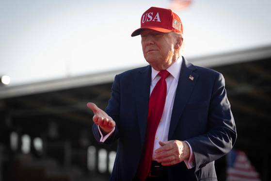 U.S. President Donald Trump arrives for a rally to kick off the July Fourth holiday weekend at the Iowa State Fairgrounds in Des Moines, Iowa, on July 3. Trump used the opportunity to tout his just-passed One Big Beautiful Bill Act, which outlines his administration's spending priorities. [AFP/YONHAP]