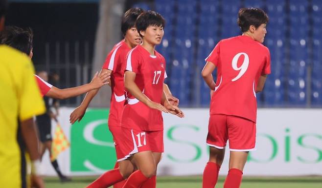 Les joueurs nord-coréens se réjouissent du succès des qualifications du groupe H de la Fédération asiatique de football de 2026 (AFC) en Corée du Nord et de la Malaisie à Tagikistan le 5. / Photo = AFC fourni