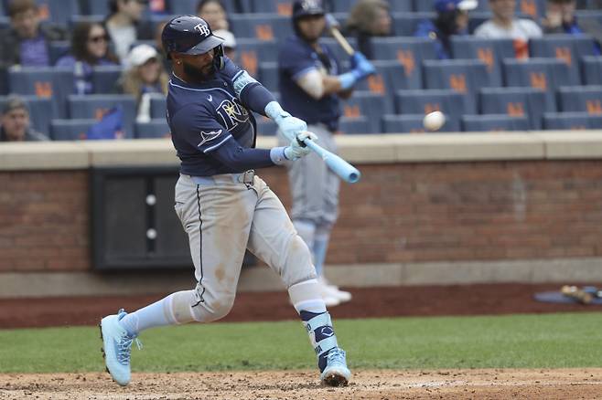 <yonhap photo-3555=""> FILE - Tampa Bay Rays' Junior Caminero hits a home run, leading Taylor Walls and Brandon Lowe to score, during the ninth inning of a baseball game against the New York Mets, Sunday, June 15, 2025, in New York. (AP Photo/Pamela Smith, File) FILE PHOTO/2025-07-09 12:22:52/ <저작권자 ⓒ 1980-2025 ㈜연합뉴스. 무단 전재 재배포 금지, AI 학습 및 활용 금지></yonhap>