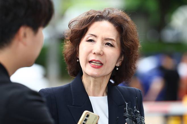 Education Minister nominee Lee Jin-soo speaks to reporters as she arrives at the Korea Institute of Educational Facility Safety in western Seoul on June 30. [YONHAP]