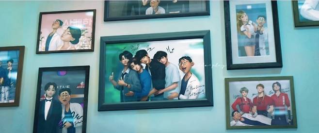 A scene from “KPop Demon Hunters” shows the wall of a traditional medicine clinic, filled with framed photos of the doctor posing with various celebrities. (Netflix)