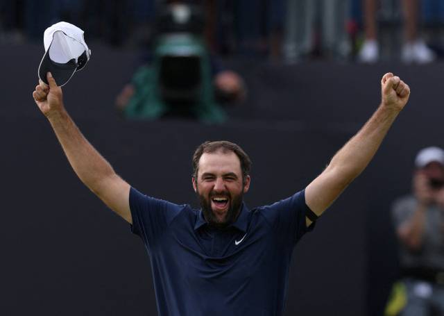 디오픈 우승을 확정한 후 손을 뻗어 포효하고 있는 스코티 셰플러. 로이터연합뉴스