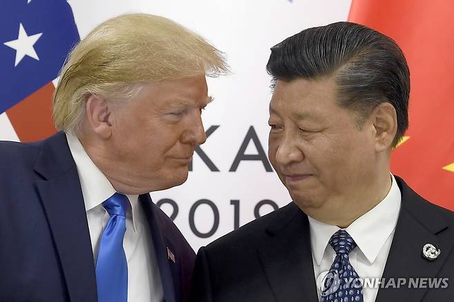 2019년 G20 정상회의에서 만난 트럼프와 시진핑 [AP 연합뉴스 자료사진. 재판매 및 DB 금지]