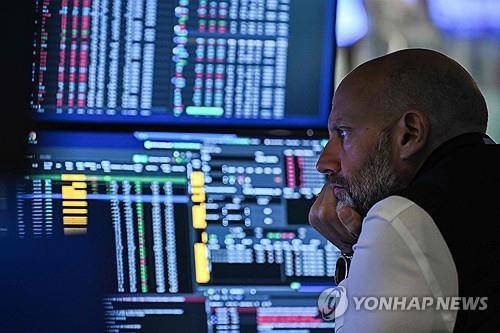 뉴욕증권거래소의 트레이더 [AFP 연합뉴스 자료사진. 재판매 및 DB 금지]