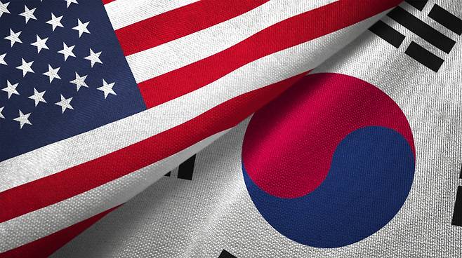 South Korea and United States flags [GETTY IMAGES BANK]