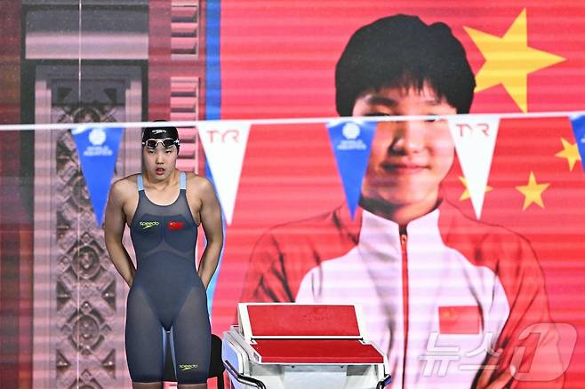 만 12세의 나이로 2025 싱가포르 세계수영선수권대회에 참가한 위쯔디. ⓒ AFP=뉴스1