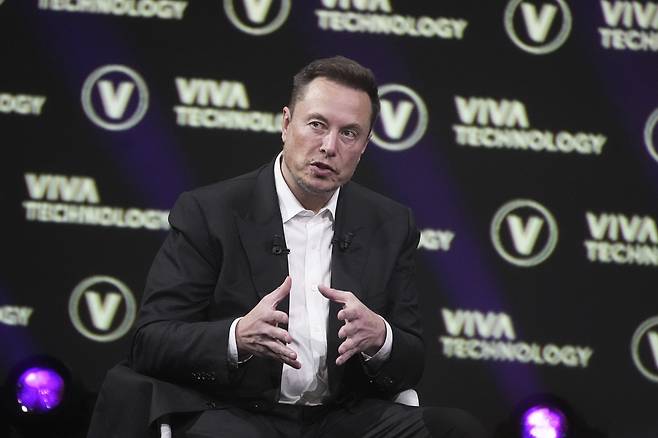 Elon Musk, who owns X, formerly Twitter, Tesla and SpaceX, speaks at the Vivatech fair in Paris on June 16, 2023. [AP/YONHAP]