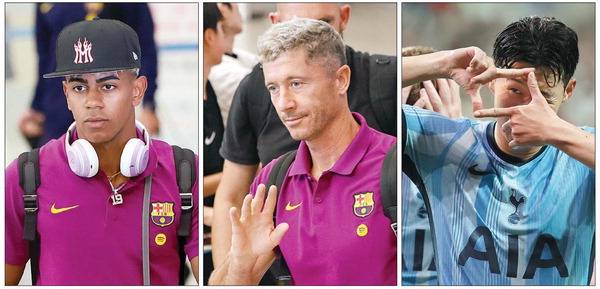 스페인 프로축구 FC 바르셀로나의 신성 라민 야말(왼쪽)과 공격수 로베르트 레반도프스키(가운데)가 프리시즌 아시아투어를 위해 29일 인천국제공항을 통해 입국하고 있다. 오른쪽은 쿠팡플레이 시리즈로 국내에서 경기를 치르는 토트넘의 손흥민. 연합뉴스