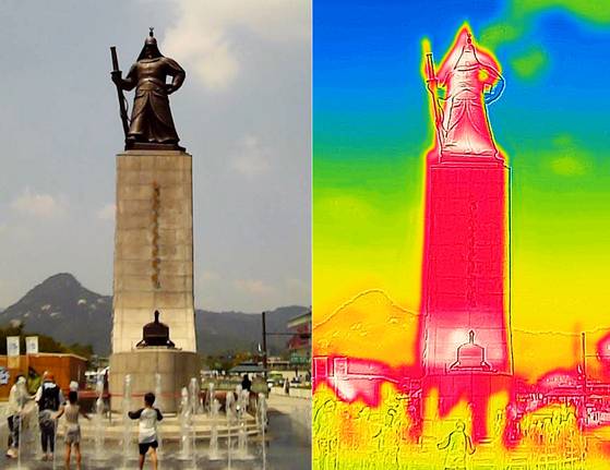 The statue of Admiral Yi Sun-sin at Gwanghwamun Square in Jongno District, central Seoul, is seen filmed with a regular camera and a thermal imaging camera on July 28. [JANG JIN-YOUNG]