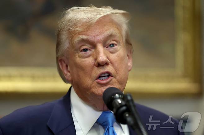 도널드 트럼프 미국 대통령이 30일(현지시간) 미국 워싱턴DC 백악관에서 열린 퇴역 군인 주택 융자 프로그램 개혁법 서명식에서 최근 진행 중인 관세 협상에 대해 설명하고 있다. 2025.07.30. ⓒ 로이터=뉴스1 ⓒ News1 류정민 특파원