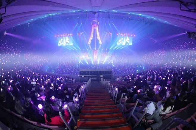 Fans hold up lightsticks and cheer during the Seoul concert for boy band Ateez's world tour ″Towards the Light: Will to Power″ held at Jamsil Stadium in Songpa District, southern Seoul on Jan 28, 2024. [KQ ENTERTAINMENT]