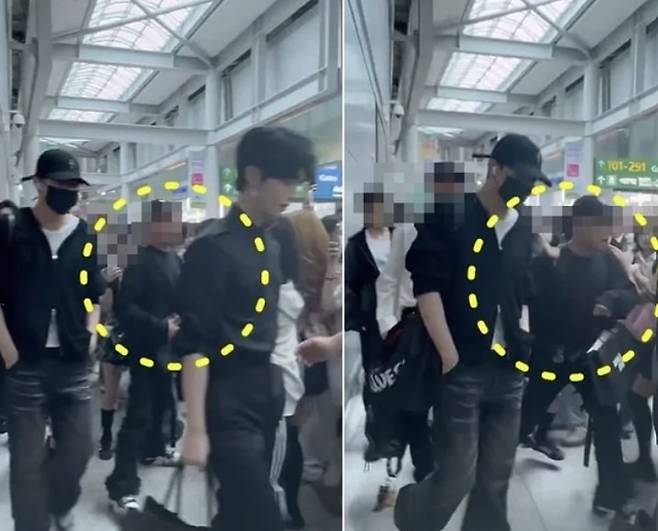 ‘제로베이스원’ 관계자가 인천공항에서 팬들에게 손을 들어올리는 모습 [사진 = A씨 엑스 갈무리]