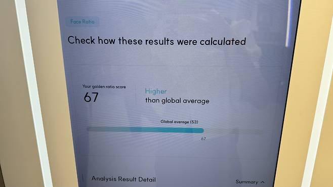 The beauty diagnosis device displays my golden ratio score based on my face ratio. [WOO JI-WON]