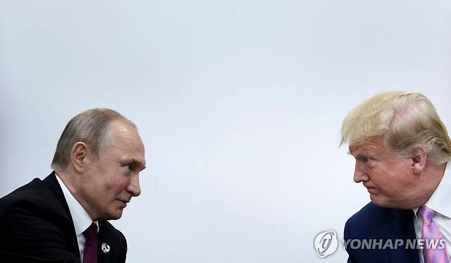 2019년 6월 오사카에서 만났던 트럼프와 푸틴 [AFP 연합뉴스 자료사진 재판매 및 DB금지]