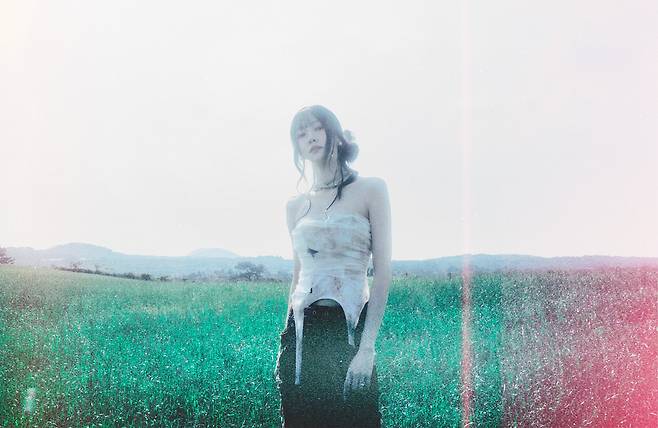Yuju of girl group GFriend will release her third EP, ″In Bloom,″ on Aug. 12. [AT AREA]