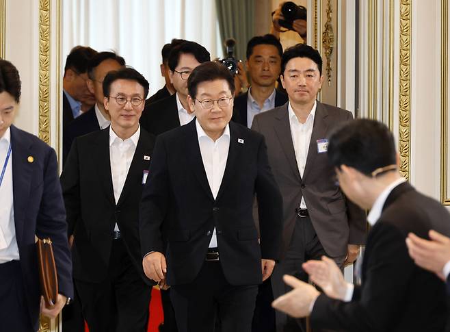 이재명 대통령이 13일 청와대 영빈관에서 국정기획위원회가 개최한 국민보고대회에 참석하고 있다. [김호영 기자]