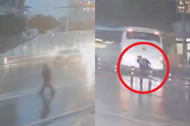 지난 12일 오후 7시26분쯤 한 50대 남성이 부산 영도구 봉래동 부산대교 진입 도로를 무단횡단해&nbsp;중앙분리대를 넘는 모습. TV조선 보도화면 캡처