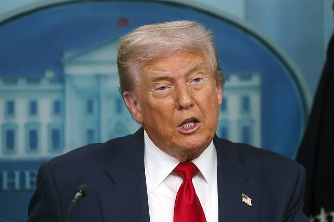 U.S. President Donald Trump addresses the media in the James S. Brady Press Briefing Room of the White House in Washington on Aug. 11. [EPA/YONHAP]