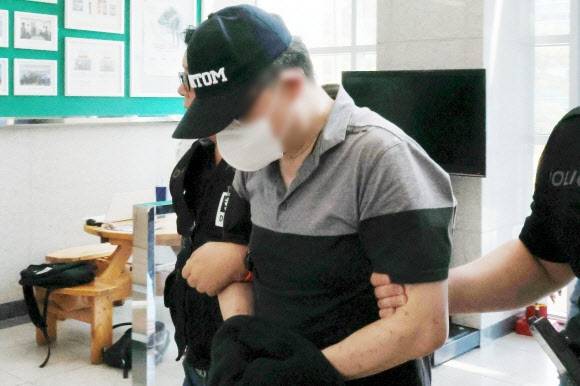 막역한 사이였던 직장동료를 대나무로 살해한 50대. [연합]