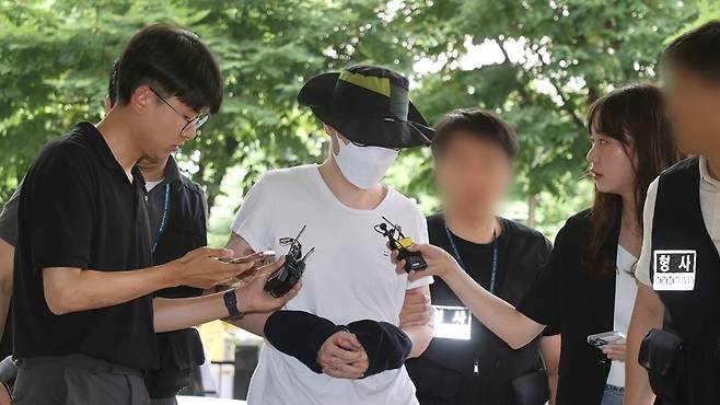지난해 7월 일본도로 한 가장을 살해한 백모(38) 씨. [연합]