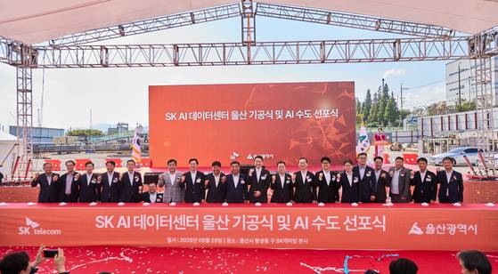 Participants pose for a photograph during SK Telecom and SK Ecoplant's groundbreaking ceremony for a new AI data center in Ulsan with Amazon Web Services and city officials on Aug. 29. [SK TELECOM]