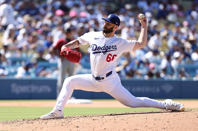 <yonhap photo-3175=""> LOS ANGELES, CALIFORNIA - AUGUST 31: Tanner Scott #66 of the Los Angeles Dodgers throws a pitch in the eighth inning against the Arizona Diamondbacks at Dodger Stadium on August 31, 2025 in Los Angeles, California. Joe Scarnici/Getty Images/AFP (Photo by Joe Scarnici / GETTY IMAGES NORTH AMERICA / Getty Images via AFP)/2025-09-01 08:22:18/ <저작권자 ⓒ 1980-2025 ㈜연합뉴스. 무단 전재 재배포 금지, AI 학습 및 활용 금지></yonhap>