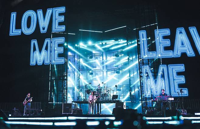 Boy band DAY6 performs during its 10th anniversary concert "The Decade" at Goyang Stadium in Gyeonggi on Sunday. [JYP ENTERTAINMENT]