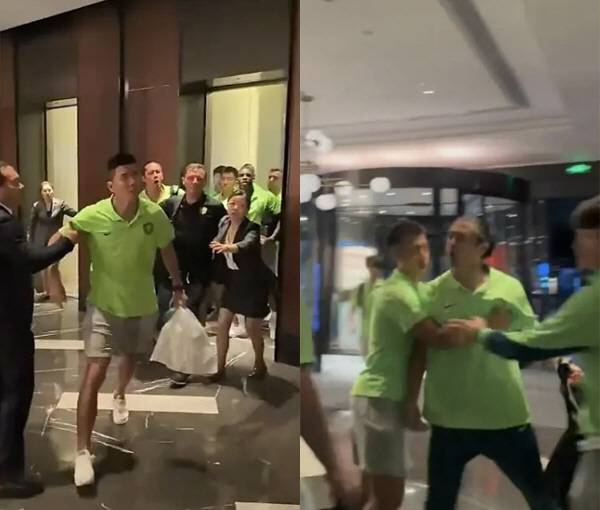 선수단 숙소 로비에서 항의하는 팬들에게 분노를 표출한 베이징 궈안 선수들.
