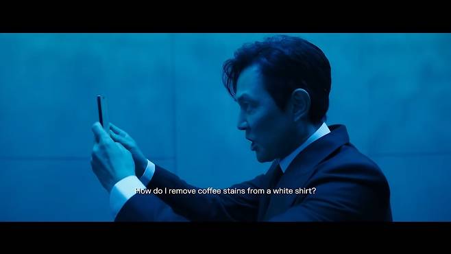 In a March 2025 YouTube advertisement, actor Lee Jung-jae uses a spoof search app called “Poogle” to answer a basic question, only to switch to Perplexity for a faster and clearer response. Cafe Curious is located on the first floor of Artist Company, the Cheongdam-based agency Lee founded and now partners with. (Screen capture from Perplexity's YouTube channel)