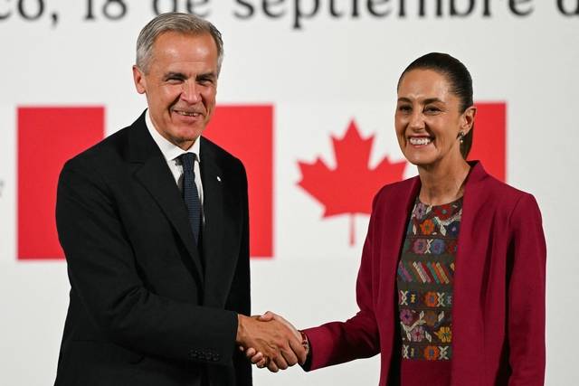 마크 카니(왼쪽) 캐나다 총리와 클라우디아 셰인바움 멕시코 대통령. AFP 연합뉴스