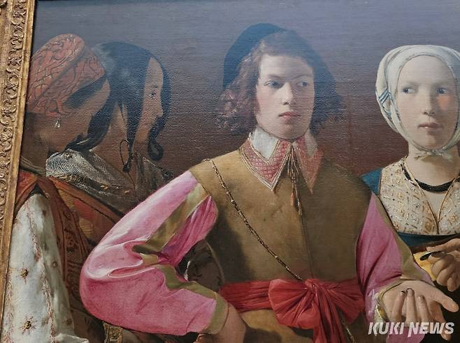 <점쟁이> 부분: 젊은이의 눈동자는 왼쪽으로, 젊은 여인은 오른쪽을 보며 경계하고 있다. &nbsp;