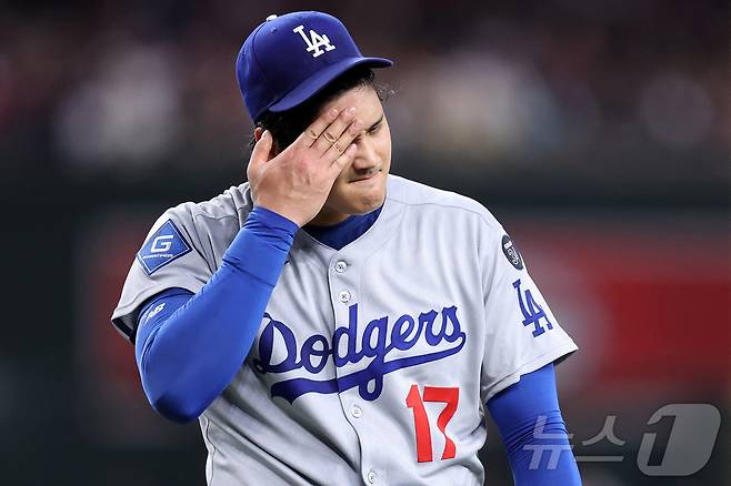 오타니 쇼헤이는 24일(한국시간) 열린 2025 메이저리그 애리조나 다이아몬드백스전에서 6이닝 8탈삼진 무실점 호투를 펼쳤지만, 불펜의 난조로 승리를 놓쳤다. ⓒ AFP=뉴스1