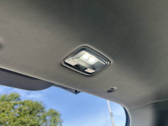 There’s a small light on the ceiling at the back, so you don’t even need a separate lamp or flashlight while camping. [SARAH CHEA]