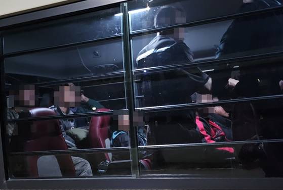 Gyeonggi police and immigration authority apprehend 13 illegal migrants near a grape farm in Pyeongtaek in 2024. [SON SUNG-BAE]