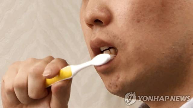 양치질하는 모습.연합뉴스