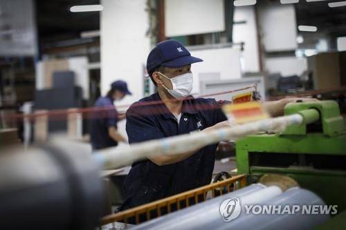 일본 공장의 외국인 노동자 [EPA = 연합뉴스]