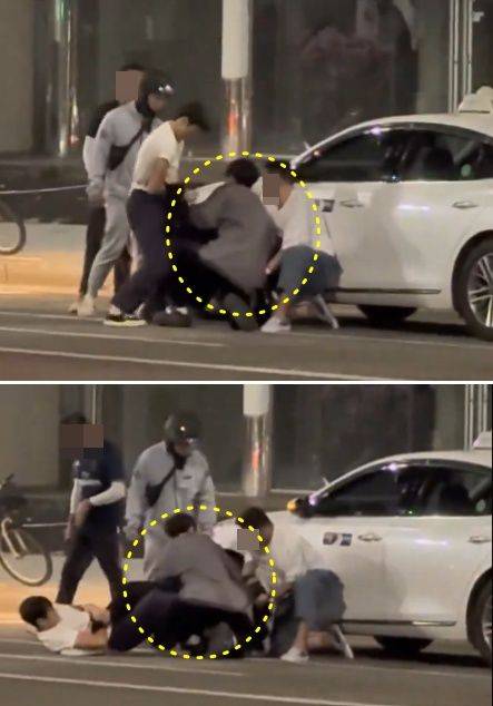 서울 강남 한복판에서 택시기사에게 폭행을 가하던 남성을 제압한 청년들의 모습이 영상으로 찍혀 온라인에 공개됐다. 이후 영상 속 청년 중 한 명이 아이돌 가수 출신이라는 게 밝혀지면서 화제가 됐다. /사진=X 캡처