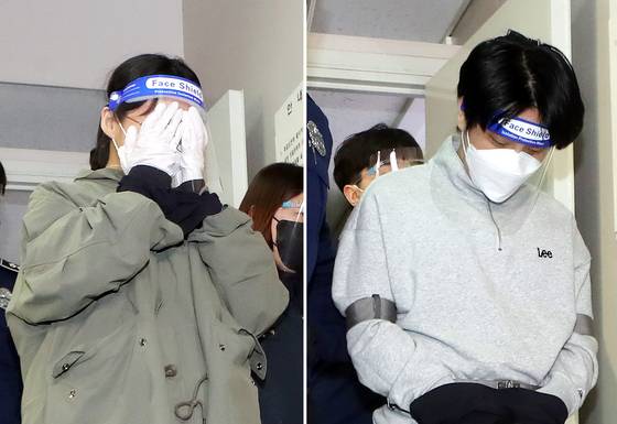 Lee Eun-hae, who murdered her then-husband, left, and Lee's affair partner, Cho Hyeon-soo, walk into the Incheon District Court for questioning in April 2022. [YONHAP]