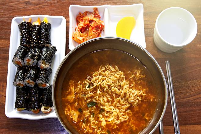 A table with ramyeon and gimbap, or seaweed rice rolls [GETTY IMAGES BANK]