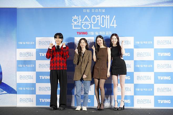 The producer and panel members of love matching TV series ″EXchange″ (2021-) pose for photos during a press conference for the franchise's fourth season in Yongsan District, central Seoul, on Oct. 1. From left are comedian Lee Yong-jin, producer Kim In-ha, actor Kim Ye-won and Yura of Girl's Day. [TVING]
