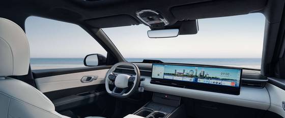The interior of Beijing Hyundai's custom-built electric vehicle, the Elexio, features infotainment features not available in the Korean market, including a 27-inch display [BEIJING HYUNDAI]